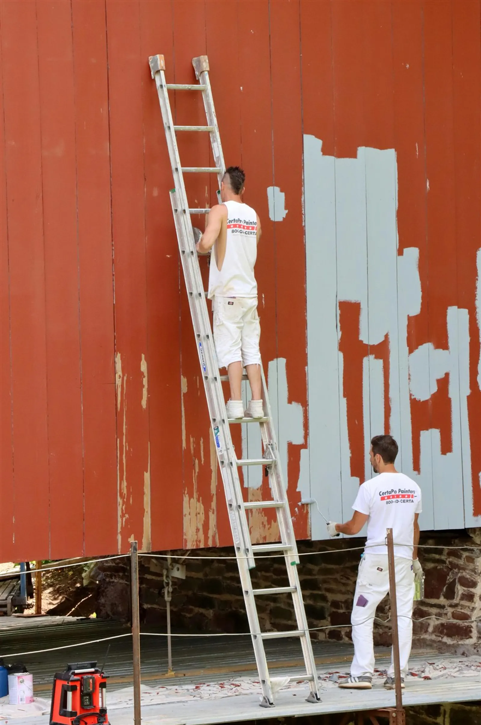 Fresh red exterior siding with painted trim